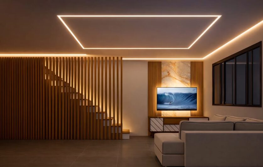 Sala de estar com home theater, escada ripada em madeira e iluminação em LED no forro